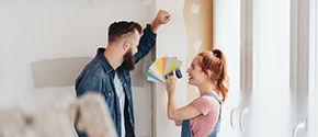 people looking at paint samples