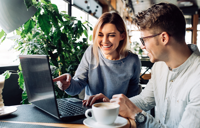 couple using laptop